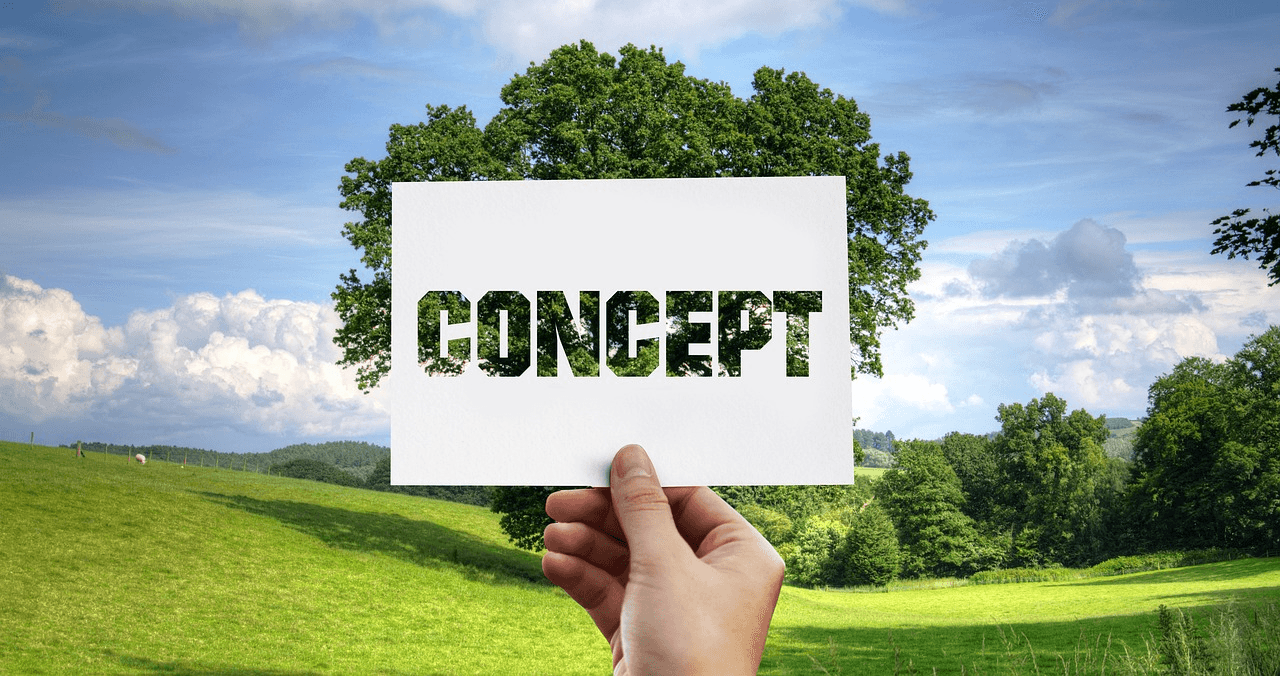 Concept card in a green landscape representing future vision