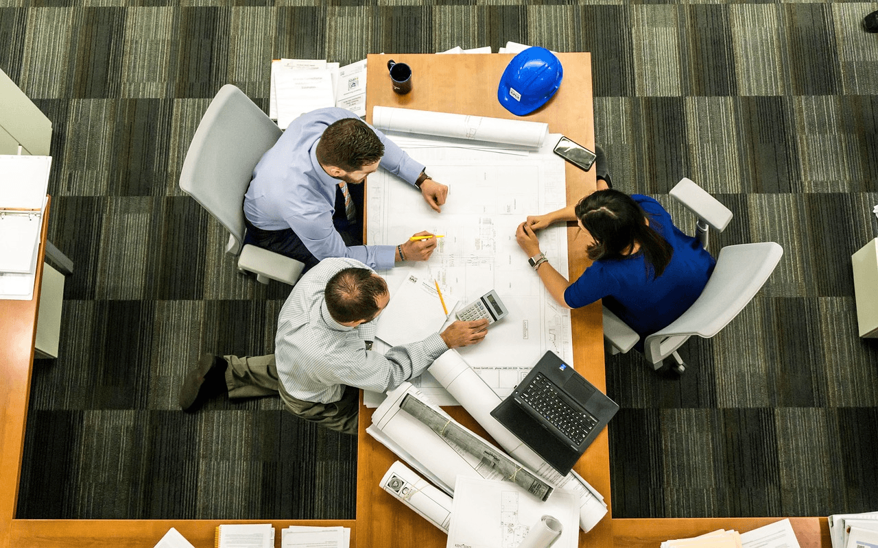 Creative planning desk with product commerce materials